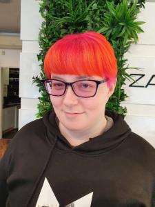 pink at the roots and orange for the rest of the hair