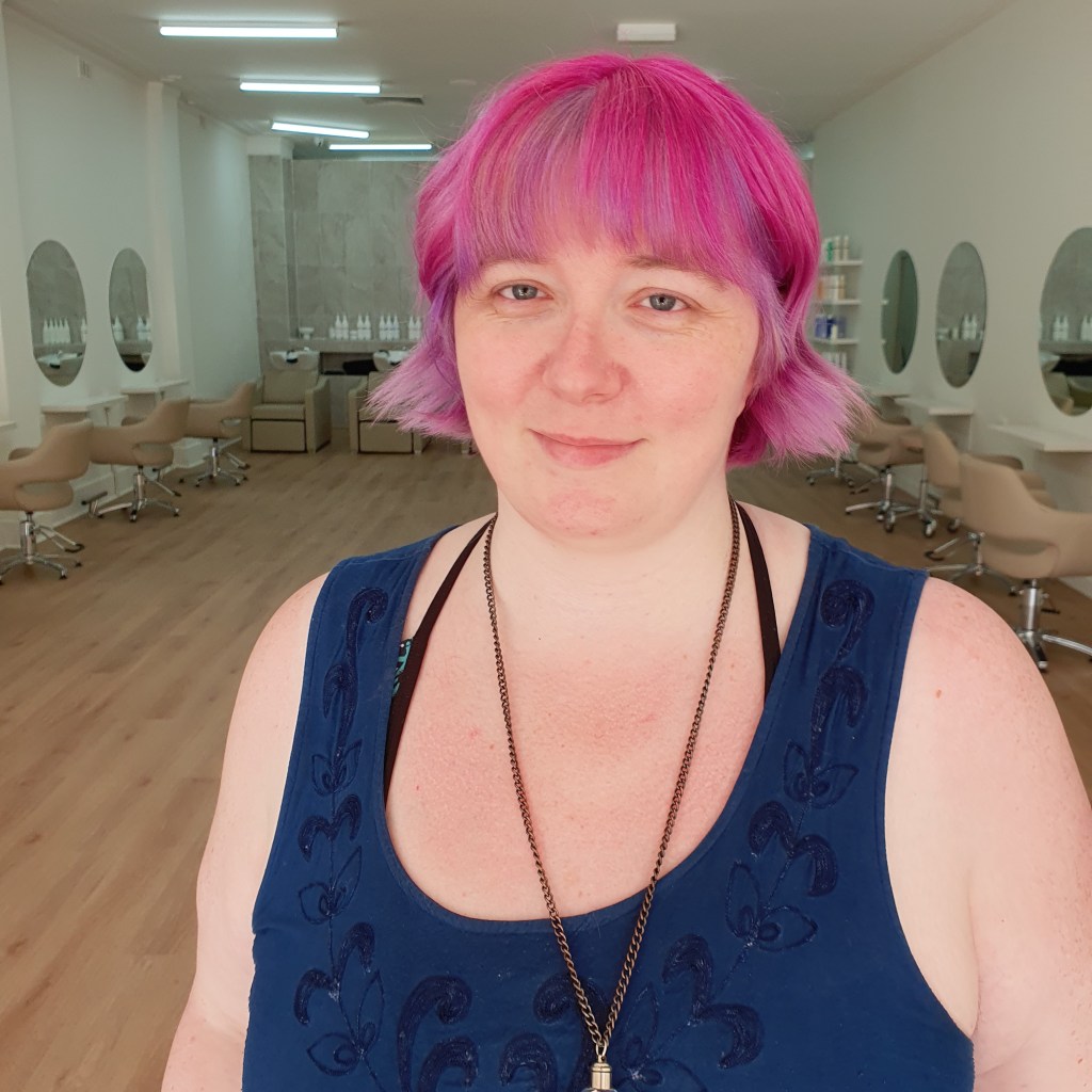 front of the bob with berry, pale pink and lavender bangs 