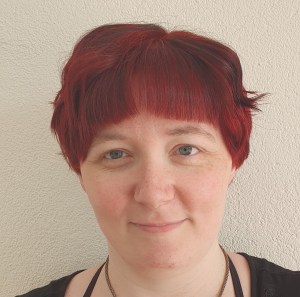 short dark red hair with black underneath 